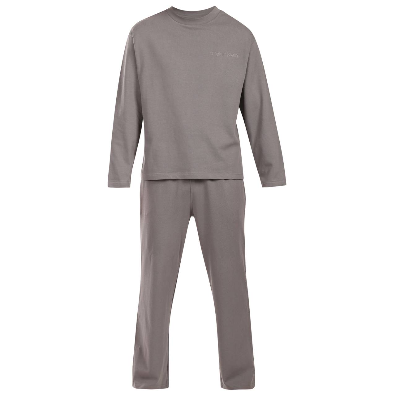 Pánske pyžamo Calvin Klein šedé (NM2951-PR8) M.
Vychutnajte si svoje večery a rána v štýle Calvin Klein – v pohodlných, mäkkých a elegantných pánskych pyžamách, ktoré vás doslova pohladia.
Čistá bavlna pre prirodzený komfort
Pánske pyžamy Calvin Klein sú vyrobené zo 100 % bavlny, ktorá je priedušná, mäkká a príjemná na dotyk.
Elegantný vzhľad, ktorý si zamilujete
Jednofarebné tričko s dlhým rukávom a dlhé vzorované nohavice sú klasickou kombináciou, ktorá vyzerá štýlovo a sofistikovane.
Prečo by ste mali vyskúšať pyžamo Calvin Klein

100 % bavlna: Prírodný, priedušný a pohodlný materiál, ktorý zaručuje komfort.
Nadčasový a elegantný dizajn Calvin Klein: Jednoduchosť, ktorá vyzerá skvele.
Pohodlný strih pre voľnosť pohybu: Ideálne na spanie a relaxáciu doma.

Spodná bielizeň Calvin Klein je obľúbená u ľudí po celom svete
Spodná bielizeň Calvin Klein je základným prvkom módneho priemyslu.
Ako sa starať o pyžamy Calvin Klein

Pranie: Práťte na 30 °C, ideálne naruby a s podobnými farbami.
Sušenie: Pyžamo môžete bezpečne sušiť v sušičke pri nízkej teplote.
Žehlenie: Žehlenie nie je potrebné – materiál je dostatočne hladký, ale ak máte radi dokonalý vzhľad, žehlite pri nízkej teplote a naruby, bez naparovania.

Tip: Staňte sa odborníkom na starostlivosť o spodnú bielizeň vďaka tipom v našom článku a poskytnite svojim obľúbeným kúskom starostlivosť, ktorú si zaslúžia.