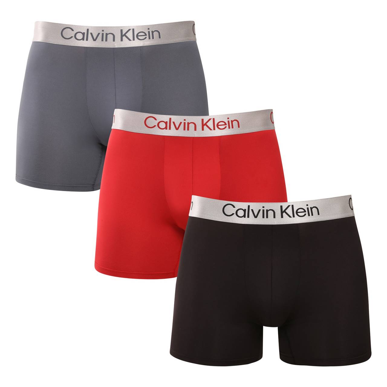 3PACK pánske boxerky Calvin Klein viacfarebné (NB4124-0GU) M, trenky.
Chcete boxerky, ktoré ponúkajú maximálne pohodlie, moderný dizajn a špičkovú kvalitu?
Prvotriedny materiál pre celodenné pohodlie
Tieto boxerky sú vyrobené z kombinácie polyesteru a elastanu, čo poskytuje dokonalú kombináciu mäkkosti, pružnosti a odolnosti.
Moderný dizajn a dokonalý strih
Minimalistický vzhľad s elastickým pásom dopĺňa logo Calvin Klein, ktoré dodáva boxerkám luxusný a sofistikovaný štýl.
Prečo si boxerky Calvin Klein zamilujete?

Ľahký a priedušný materiál: Ideálne na každodenné nosenie aj náročné športové aktivity.
Dlhšia nohavička: Poskytuje lepšie krytie a oporu, nezhrňuje sa a neškrtí.
Rýchloschnúce a odolné: Ideálne na aktívny životný štýl.
Nadčasový dizajn: minimalistický dizajn a luxusný vzhľad značky Calvin Klein.

Spodnú bielizeň Calvin Klein milujú ľudia na celom svete.
Pánska spodná bielizeň Calvin Klein patrí k stáliciam módneho priemyslu.
Ako sa starať o boxerky?
Aby si vaše boxerky zachovali dokonalý tvar a kvalitu čo najdlhšie, dodržiavajte tieto pokyny:

Praní: Doporučujeme prát na 30 °C s jemným pracím prostředkem.
Žehlení: Nedoporučuje se, aby nedošlo k poškození materiálu.
Sušenie: Sušenie v sušičke sa neodporúča, radšej sušte voľne na vzduchu.

Tip: Nájsť ten správny kus spodnej bielizne, ktorý vám dokonale padne, môže byť náročné.
