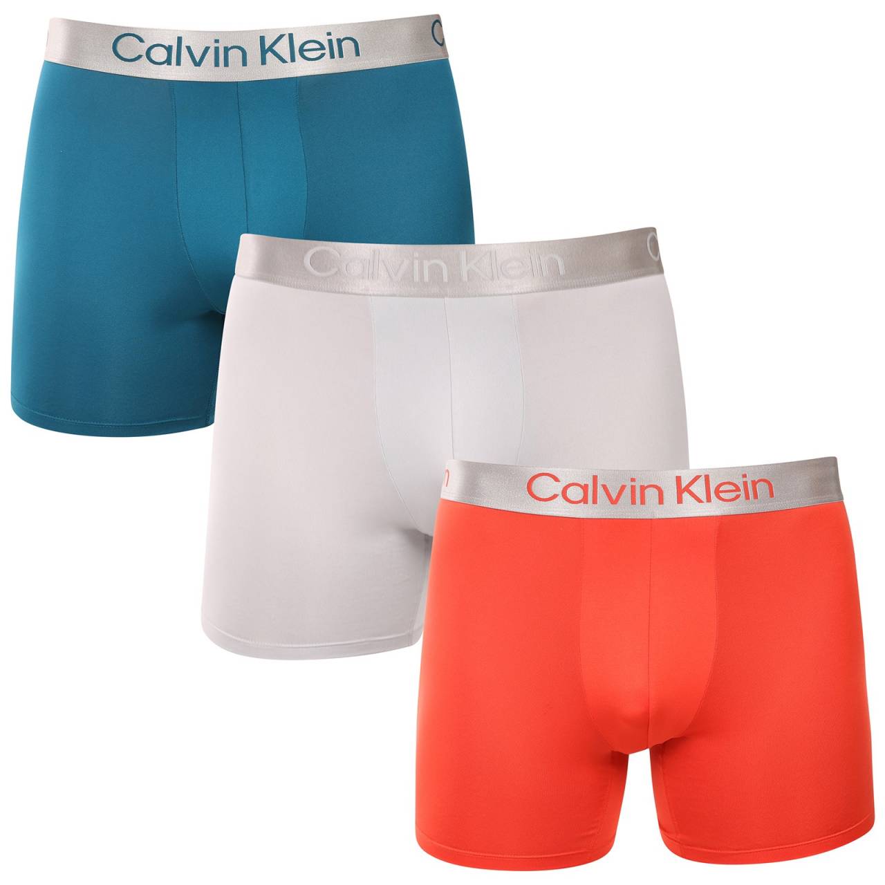 3PACK pánske boxerky Calvin Klein viacfarebné (NB4124-0HD) XL, trenky.
Chcete boxerky, ktoré ponúkajú maximálne pohodlie, moderný dizajn a špičkovú kvalitu?
Prvotriedny materiál pre celodenné pohodlie
Tieto boxerky sú vyrobené z kombinácie polyesteru a elastanu, čo poskytuje dokonalú kombináciu mäkkosti, pružnosti a odolnosti.
Moderný dizajn a dokonalý strih
Minimalistický vzhľad s elastickým pásom dopĺňa logo Calvin Klein, ktoré dodáva boxerkám luxusný a sofistikovaný štýl.
Prečo si boxerky Calvin Klein zamilujete?

Ľahký a priedušný materiál: Ideálne na každodenné nosenie aj náročné športové aktivity.
Dlhšia nohavička: Poskytuje lepšie krytie a oporu, nezhrňuje sa a neškrtí.
Rýchloschnúce a odolné: Ideálne na aktívny životný štýl.
Nadčasový dizajn: minimalistický dizajn a luxusný vzhľad značky Calvin Klein.

Spodnú bielizeň Calvin Klein milujú ľudia na celom svete.
Pánska spodná bielizeň Calvin Klein patrí k stáliciam módneho priemyslu.
Ako sa starať o boxerky?
Aby si vaše boxerky zachovali dokonalý tvar a kvalitu čo najdlhšie, dodržiavajte tieto pokyny:

Praní: Doporučujeme prát na 30 °C s jemným pracím prostředkem.
Žehlení: Nedoporučuje se, aby nedošlo k poškození materiálu.
Sušenie: Sušenie v sušičke sa neodporúča, radšej sušte voľne na vzduchu.

Tip: Nájsť ten správny kus spodnej bielizne, ktorý vám dokonale padne, môže byť náročné.