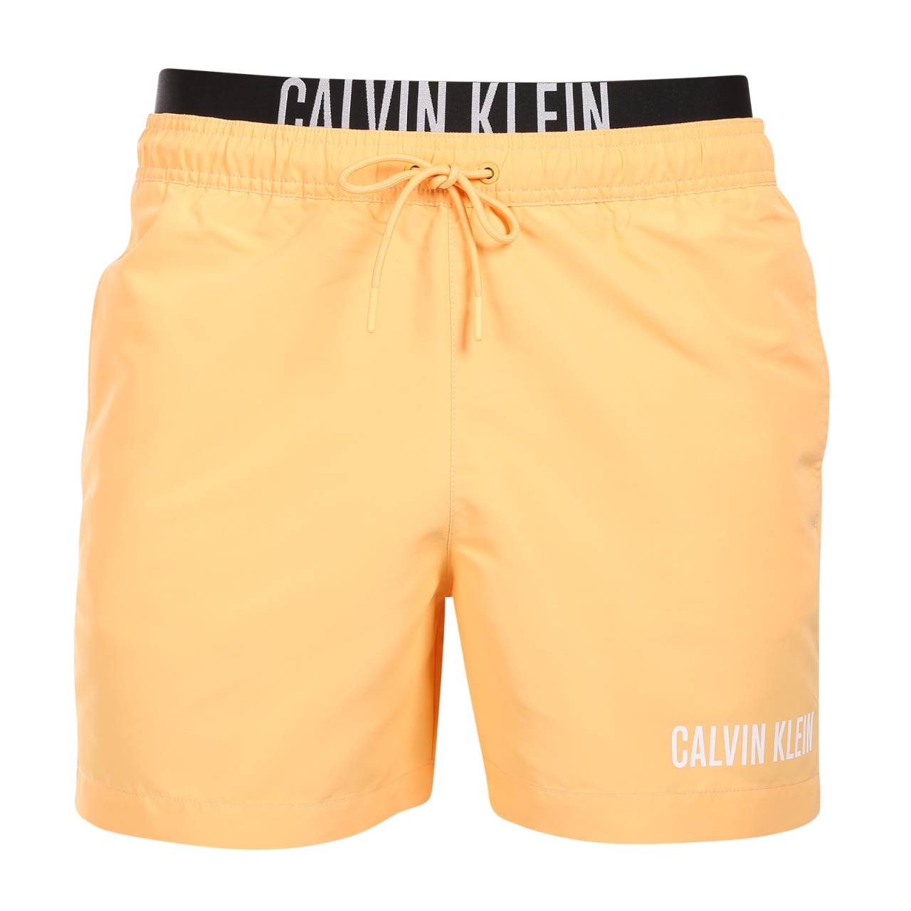 Pánske plavky Calvin Klein oranžové (KM0KM00992-SAN) L.
Chcete vyzerať štýlovo a zároveň si užívať maximálne pohodlie?
Ľahký a funkčný materiál vám zaručí pohodlie
Plavky sú vyrobené z ľahkého polyesteru, ktorý rýchlo schne a je veľmi odolný.
Pohodlný strih na každú príležitosť
Plavky Calvin Klein majú kratšie nohavičky, takže vás neobmedzujú a nechajú vyniknúť vaše nohy.
Prečo by vám plavky Calvin Klein nemali chýbať v šatníku

Prémiový dizajn: Luxusný vzhľad s ikonickým logom Calvin Klein.
Rýchloschnúci materiál.
Perfektný strih: Krátke nohavičky a elastický pás so šnúrkou na stiahnutie sa vám prispôsobia a zabezpečia maximálnu voľnosť pohybu.

Spodnú bielizeň Calvin Klein milujú ľudia na celom svete
Pánska spodná bielizeň Calvin Klein patrí k stáliciam módneho priemyslu.
Ako sa starať o svoje plavky?
Aby vám plavky vydržali ako nové, je dôležité venovať im správnu starostlivosť:

Pranie: Odporúča sa pri 30 °C s jemným pracím prostriedkom.
Sušenie: Nie je vhodné sušiť v bubnovej sušičke - najlepšie je nechať ich uschnúť na vzduchu.
Žehlenie: Nežehlite, materiál sa prirodzene vyrovná.

Tip: Výber plaviek, ktoré vám dokonale padnú a zvýraznia váš štýl, môže byť behom na dlhé trate.