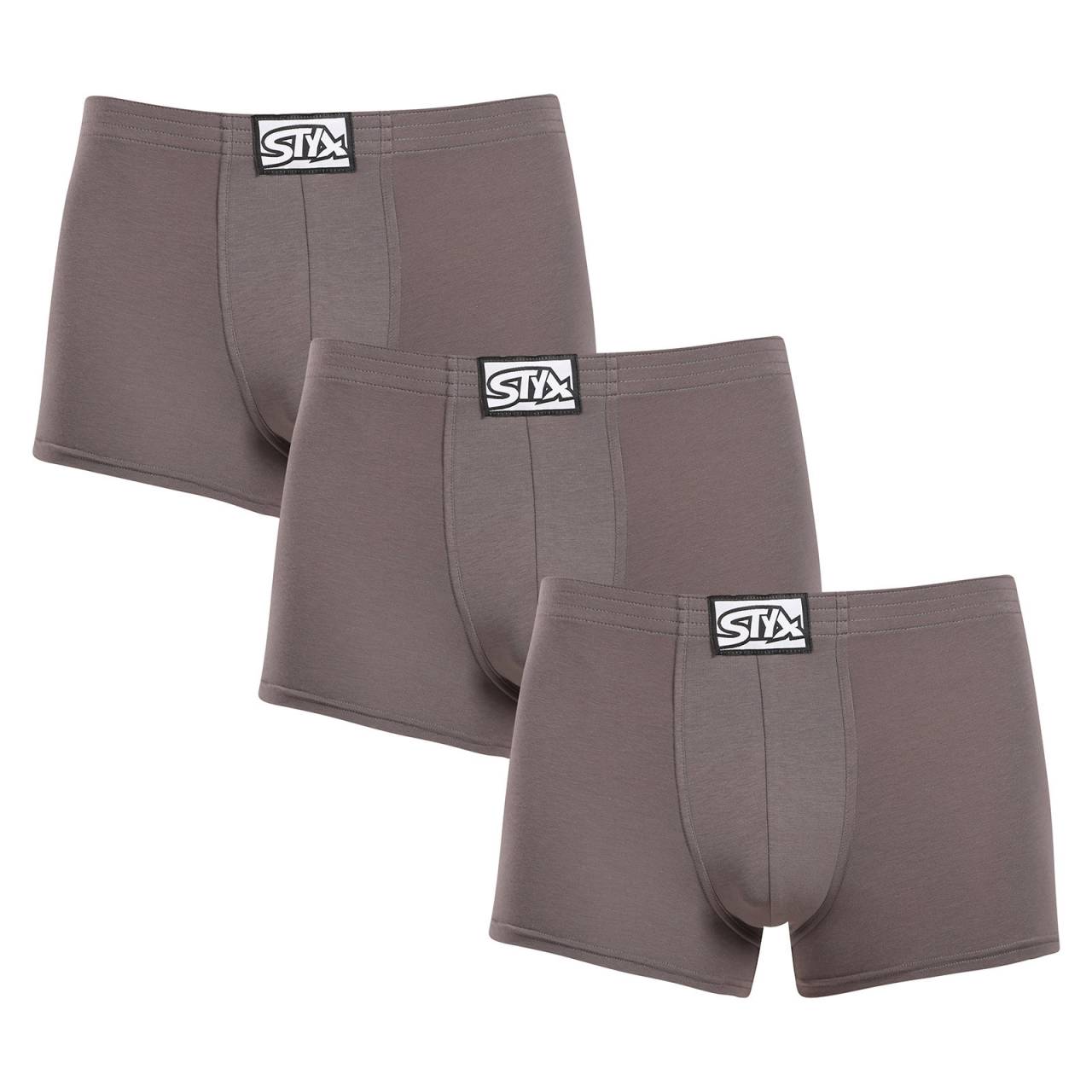 3PACK pánske boxerky Styx klasická guma tmavo sivé (3Q1063) XXL, trenky.
Hľadáte dokonalú kombináciu pohodlia, štýlu a kvality?
Prvotriedny materiál pre dokonalé pohodlie
Tieto boxerky sú vyrobené z jedinečnej zmesi bavlny, modalu a elastanu.
Perfektne padnúce a pohodlné klasické elastické
Pánske boxerky Styx majú kratšie nohavičky, ktoré sa nikdy nevyhrnú a poskytujú maximálnu voľnosť pohybu.
Prečo si boxerky Styx zamilujete

Prvotriedna kombinácia bavlny a modalu: Mäkká, priedušná a príjemná na telo.
Kratšie nohavičky: Žiadne vyhrňovanie a maximálna voľnosť pohybu.
Klasický elastický pás: Netlačí, ale drží ich pevne na mieste.
Vhodné na bežné nosenie a šport: Skvelá voľba pre aktívnych mužov.
Vyrobené v ČR: Česká kvalita a precízne spracovanie.

Spodná bielizeň Styx patrí medzi najobľúbenejšie.
Česká značka Styx je medzi zákazníkmi známa najmä vďaka spodnej bielizni s neotrelými vzormi vo výrazných farbách.
Ako sa starať o boxerky Styx?
Aby vám obľúbené boxerky dlho vydržali, odporúčame nasledujúce tipy:

Pranie: Odporúčame prať na 30 ° C, aby si materiál zachoval svoju jemnosť a elasticitu.
Sušenie: Nevhodné do sušičky, aby sa predišlo strate pružnosti a poškodeniu vlákien.
Žehlenie: Pokiaľ je potrebné, je možné žehliť na nízku teplotu, ale odporúčame žehliť naruby.

Tip: Nájsť ten správny kus spodnej bielizne, ktorý vám dokonale padne, môže byť náročné.
