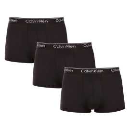 3PACK pánske boxerky Calvin Klein čierne (NB4409-UB1) S, trenky.
Chcete boxerky, ktoré ponúkajú maximálne pohodlie, moderný dizajn a špičkovú kvalitu?
Prvotriedny materiál pre celodenné pohodlie
Tieto boxerky sú vyrobené z kombinácie polyesteru a elastanu, čo poskytuje dokonalú kombináciu mäkkosti, pružnosti a odolnosti.
Moderný dizajn a dokonalý strih
Minimalistický vzhľad s elastickým pásom dopĺňa logo Calvin Klein, ktoré dodáva boxerkám luxusný a sofistikovaný štýl.
Prečo si boxerky Calvin Klein zamilujete?

Ľahký a priedušný materiál: Ideálne na každodenné nosenie aj náročné športové aktivity.
Dlhšia nohavička: Poskytuje lepšie krytie a oporu, nezhrňuje sa a neškrtí.
Rýchloschnúce a odolné: Ideálne na aktívny životný štýl.
Nadčasový dizajn: minimalistický dizajn a luxusný vzhľad značky Calvin Klein.

Spodnú bielizeň Calvin Klein milujú ľudia na celom svete.
Pánska spodná bielizeň Calvin Klein patrí k stáliciam módneho priemyslu.
Ako sa starať o boxerky?
Aby si vaše boxerky zachovali dokonalý tvar a kvalitu čo najdlhšie, dodržiavajte tieto pokyny:

Praní: Doporučujeme prát na 30 °C s jemným pracím prostředkem.
Žehlení: Nedoporučuje se, aby nedošlo k poškození materiálu.
Sušenie: Sušenie v sušičke sa neodporúča, radšej sušte voľne na vzduchu.

Tip: Nájsť ten správny kus spodnej bielizne, ktorý vám dokonale padne, môže byť náročné.