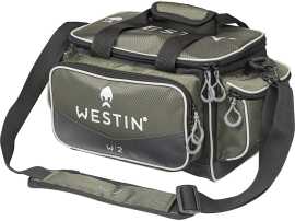 Westin taška w2 lure bag 3 boxes forest night - small.
 •Rozmery: Malá: 43 x 25 x 22 cm / Veľká: 55 x 31 x 25 cm •Hlavný materiál: Diamantovo tkaný polyester / 600D čierny polyester s povrchovou úpravou •Malá (Small): Obsahuje tri originálne Westin krabičky na náradie B02-706-027 (27,5 x 18,5 x 4,5 cm) Veľká (Large): Obsahuje dve originálne Westin krabičky na náradie B02-706-037 (36 x 22 x 4,8 cm) a jednu krabičku na náradie Westin B02-706-036 (36 x 22 x 8 cm) 
 •Vodeodolné materiály •Dve veľké bočné vrecká na nástroje a príslušenstvo • Jedno veľké predné vrecko •Polstrovaná rukoväť na nosenie a polstrovaný ramenný popruh •Spevnené a vodeodolné dno