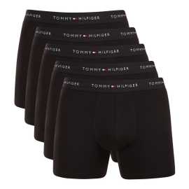 5PACK pánske boxerky Tommy Hilfiger čierné (UM0UM03751 0SE) XXL, trenky.
Doprajte si nadčasový štýl a špičkový komfort s pánskymi boxerkami od značky Tommy Hilfiger.
Prémiový materiál pre maximálne pohodlie
Boxerky Tommy Hilfiger sú vyrobené z jemnej, na dotyk veľmi príjemnej bavlny s prímesou elastanu, ktorý im dodáva pružnosť a dlhú životnosť.
Ikonyický štýl a precízny strih
Boxerky majú dlhšie nohavičky, ktoré sa nevyhrávajú a poskytujú dostatočné zakrytie a komfort.
Prečo by vám boxerky Tommy Hilfiger nemali chýbať

Prémiová bavlna s elastanom: Mäkká, priedušná a pohodlná na celodenné nosenie.
Dlhšie nohavičky a vyšívaný guma: Stabilita, štýl a žiadne rolovanie.
Elegantný a nadčasový dizajn: Skvelé na každodenné aj špeciálne príležitosti.

Spodná bielizeň Tommy Hilfiger je zárukou najvyššej kvality
Značka Tommy Hilfiger sa stala ikonou amerického obliekania pred takmer 40 rokmi a jej farebnosť v odtieňoch modrej, červenej a bielej je rozpoznateľná na prvý pohľad.
Ako sa starať o boxerky Tommy Hilfiger

Pranie: Per na 30 °C.
Sušenie: Boxerky možno sušiť v sušičke pri nízkej teplote.
Žehlenie: V prípade potreby je možné ich žehliť na nižšiu teplotu.

Tip: Nájdenie ideálneho kúsku spodnej bielizne môže byť niekedy náročné.