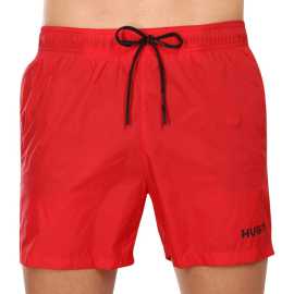 Pánske plavky HUGO červené (50469312 693) L.
Doprajte si svieži štýl a pohodlie s týmito pánskymi plavkami HUGO, ktoré sú dokonalou kombináciou jednoduchého dizajnu a prvotriednej kvality.
Kvalitný materiál pre maximálnu funkčnosť
Tieto pánske plavky sú vyrobené z polyamidu, ktorý zaručuje ľahkosť, rýchle schnutie a vynikajúcu odolnosť voči vode a slnku.
Moderný strih a minimalistický dizajn
Plavky majú klasický voľný strih, ktorá poskytuje dostatok voľnosti pohybu.
Výhody, ktoré pri plavkách HUGO naozaj oceníte

Rýchloschnúci materiál: Už žiadne dlhé čakanie na uschnutie.
Klasická elastická guma s logom HUGO: Štýl a pohodlie v jednom.
Odolnosť voči chlóru a UV žiareniu: Ideálne do bazéna a na slnko.
Jednoduchý, ale výrazný dizajn: Vždy vkusný a mužný vzhľad.

Spodná bielizeň Hugo pre milovníkov pohodlia a luxusu
Značka spodnej bielizne Hugo patrí do rodiny odevov Hugo Boss a vyniká kvalitnými materiálmi a precíznym spracovaním.
Ako sa starať o plavky HUGO
Aby vám radosť z nových plaviek vydržala, odporúčame dodržiavať tieto tipy.

Pranie: Používajte jemné pracie prostriedky bez zmäkčovadiel a bielidiel, ktoré môžu poškodiť vlákna alebo spôsobiť stratu farby.
Sušenie: Sušenie v sušičke sa neodporúča.
Žehlenie: Polyamid si zachováva svoj hladký vzhľad bez potreby žehlenia a vystavenie vysokým teplotám by mohlo poškodiť jeho štruktúru.

Tip: Výber plaviek, ktoré vám dobre padnú a zvýraznia váš štýl, môže byť behom na dlhú trať.