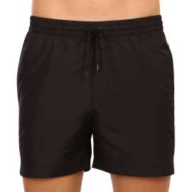 Moške kopalke Calvin Klein črne (KM0KM00741 BEH) S.
Želite biti videti elegantno in hkrati uživati v največjem udobju?
Lahkoten in funkcionalen material vam zagotavlja udobje
Kopalke so izdelane iz lahkega poliestra, ki se hitro suši in je zelo trpežen.
Udobno prileganje za vsako priložnost
Kopalke Calvin Klein imajo krajše noge, zato vas ne omejujejo in pustijo vaše noge na ogled.
Zakaj v vaši garderobi ne smejo manjkati kopalke Calvin Klein

Vrhunska zasnova: Razkošen videz z ikoničnim logotipom Calvin Klein.
Material za hitro sušenje.
Odličen kroj: Kratke nogavice in elastičen pas z vrvico se bodo prilagodili vašemu telesu in zagotovili največjo svobodo gibanja.

Spodnje perilo Calvin Klein obožujejo ljudje po vsem svetu
Moško spodnje perilo Calvin Klein je ena od stalnic modne industrije.
Kako skrbeti za kopalke?
Če želite zagotoviti, da bodo vaše kopalke trajale kot nove, je pomembno, da jih pravilno negujete:

Pralnica: Priporočeno za 30 °C z blagim detergentom.
Sušenje: Ni primerno za sušenje v sušilnem stroju - najbolje je, da se posuši na zraku.
Likanje: Ne likate, material se naravno zravna.

Nasvet: Izbira kopalk, ki se vam popolnoma prilegajo in poudarjajo vaš slog, je lahko dolgotrajna.