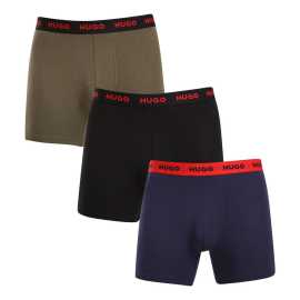 3PACK Herren Klassische Boxershorts HUGO mehrfarbig (50517886 966) XXL.
Setzen Sie auf zeitlose Eleganz und höchsten Komfort mit den HUGO Herren-Boxershorts.
Material, das sich perfekt an Sie anpasst
Die Kombination aus hochwertiger Baumwolle mit einem Hauch von Elastan sorgt für eine optimale Kombination aus Komfort und Flexibilität.
Ein Stil, der für sich selbst spricht
Die nüchterne Farbgebung ist für alle Männer geeignet, die keine Exzentrik mögen.
Warum Sie HUGO Boxershorts lieben werden

Hochwertiges Material aus einer Kombination von Baumwolle und Elastan.
Elegantes Design in klassischen Farben.
Längere Beine für mehr Komfort.

Hugo Unterwäsche für Liebhaber von Komfort und Luxus
Die Marke Hugo Underwear gehört zur Bekleidungsfamilie Hugo Boss und zeichnet sich durch hochwertige Materialien und präzise Verarbeitung aus.
Pflegehinweise für HUGO Boxershorts
Damit Ihre Lieblingsboxer lange halten, empfehlen wir Ihnen, diese Tipps zu befolgen.

Waschen: Der Stift hat eine Temperatur von 40 °C.
Trocknen: Sie können Ihre Boxershorts im Wäschetrockner im Schonprogramm trocknen.
Bügeln: Falls erforderlich, bügeln Sie sie bei niedrigerer Temperatur von innen nach außen.

Tip: Werden Sie ein Experte für die Pflege von Unterwäsche mit den Ratschlägen in unserem Artikel und geben Sie Ihren Lieblingsstücken die Pflege, die sie verdienen.