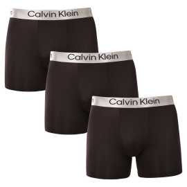 3PACK Boxers pour hommes Calvin Klein noir (NB4124-UB1) 4XL.
Vous voulez des boxers qui vous offrent un confort parfait, un design moderne et une qualité supérieure?
Matériau de première qualité pour un confort tout au long de la journée
Ce caleçon est fabriqué à partir d'une combinaison de polyester et d'élasthanne, offrant une combinaison parfaite de douceur, d'élasticité et de durabilité.
Design moderne et ajustement parfait
Le look minimaliste avec une ceinture élastique est complété par le logo Calvin Klein, ce qui confère à ces boxers un style luxueux et sophistiqué.
Pourquoi aimerez-vous les caleçons Calvin Klein ?

Matériau léger et respirant: Idéal pour le quotidien et les activités sportives exigeantes.
Culotte plus longue : Ils offrent une meilleure couverture et un meilleur soutien, ne s'enroulent pas et ne se compriment pas.
Séchage rapide et durable : Parfait pour un mode de vie actif.
Un design intemporel : Le design minimaliste et l'aspect luxueux de Calvin Klein.

Les sous-vêtements Calvin Klein sont appréciés dans le monde entier.
Les sous-vêtements pour hommes Calvin Klein sont l'un des piliers de l'industrie de la mode.
Comment entretenir un boxer ?
Pour que votre boxer conserve le plus longtemps possible sa forme et sa qualité parfaites, suivez les conseils suivants :

Blanchisserie : Nous recommandons un lavage à 30 °C avec un détergent doux.
Repassage: Il n'est pas recommandé de l'utiliser pour éviter d'endommager le matériau.
Sèche-linge: Le séchage dans le sèche-linge n'est pas recommandé, il est préférable de sécher librement à l'air.

Conseil : Trouver le sous-vêtement qui vous convient parfaitement peut s'avérer difficile.