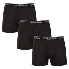 3PACK Herren Klassische Boxershorts Calvin Klein schwarz (NB4410-UB1) 3XL.
Sie wollen Boxershorts, die Ihnen perfekten Komfort, modernes Design und höchste Qualität bieten?
Hochwertiges Material für ganztägigen Komfort
Diese Boxershorts bestehen aus einer Kombination aus Polyester und Elastan und bieten die perfekte Kombination aus Weichheit, Dehnbarkeit und Haltbarkeit.
Modernes Design und perfekte Passform
Der minimalistische Look mit einem Bund mit Gummizug wird durch das Calvin Klein-Logo ergänzt und verleiht den Boxershorts einen luxuriösen und raffinierten Stil.
Warum werden Sie Calvin Klein Boxershorts lieben?

Leichtes und atmungsaktives Material: Ideal für das tägliche Tragen und anspruchsvolle sportliche Aktivitäten.
Längere Höschen: Sie bieten eine bessere Abdeckung und Unterstützung, verknäueln nicht und drücken nicht.
Schnell trocknend und langlebig: Perfekt für einen aktiven Lebensstil.
Zeitloses Design: Das minimalistische Design und der luxuriöse Look von Calvin Klein.

Calvin Klein Unterwäsche wird von Menschen auf der ganzen Welt geliebt
Calvin Klein Herrenunterwäsche gehört zu den Aushängeschildern der Modeindustrie.
Wie pflegt man Boxershorts?
Damit Ihre Boxershorts so lange wie möglich ihre perfekte Form und Qualität behalten, sollten Sie die folgenden Hinweise beachten:

Waschen: Wir empfehlen das Waschen bei 30 °C mit Feinwaschmittel.
Bügeln: Es wird nicht empfohlen, um eine Beschädigung des Materials zu vermeiden.
Trockner: Das Trocknen im Trockner wird nicht empfohlen, sondern das Trocknen an der Luft.

Tip: Es kann schwierig sein, die richtige Unterwäsche zu finden, die perfekt sitzt.